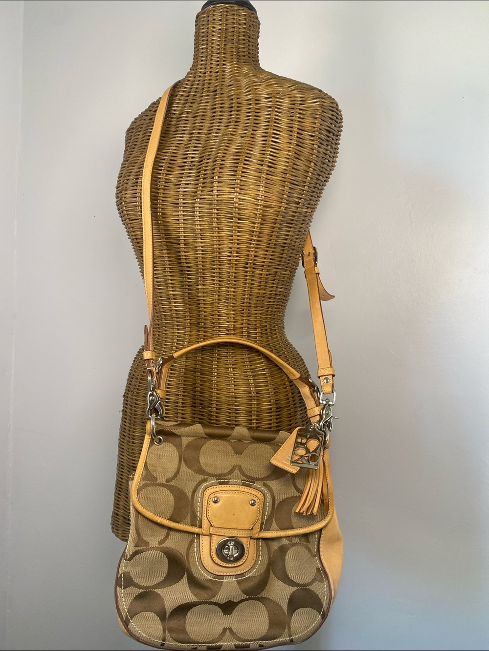 Coach Khaki and Tan Signature Saddle Bag with Tassel